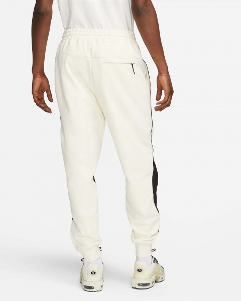 Штани Nike M NK SWOOSH FLC PANT DX0564-113 р. XL бежевий
