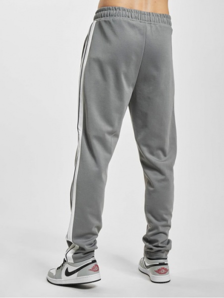 Брюки Ellesse ADELFIA TRACK PANT SHR17438-109 р. L серый