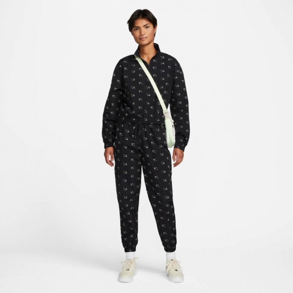 Штани Nike W NSW AIR AOP WVN MR PNT DV8058-010 р. M чорний