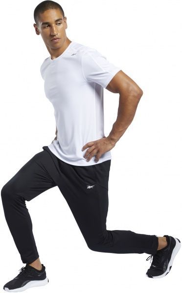 Брюки Reebok WOR KNIT PANT FJ4057 р. S черный