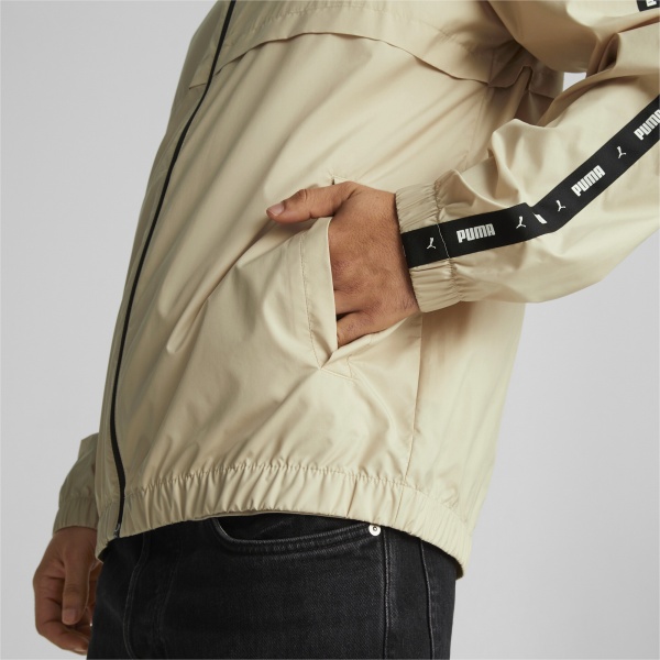 Ветровка Puma PUMA ESS+ Tape WINDBREAKER 84747788 р.XL бежевый