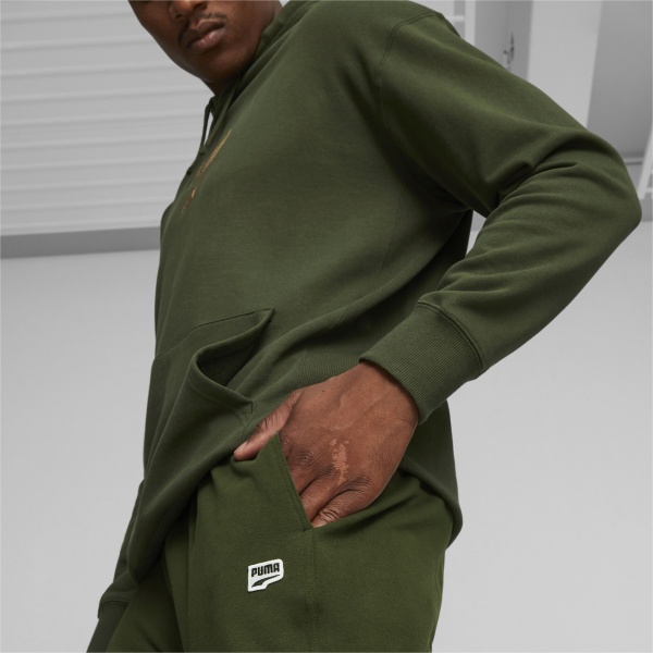 Брюки Puma DOWNTOWN SWEATPANTS TR 62128731 р. M зеленый