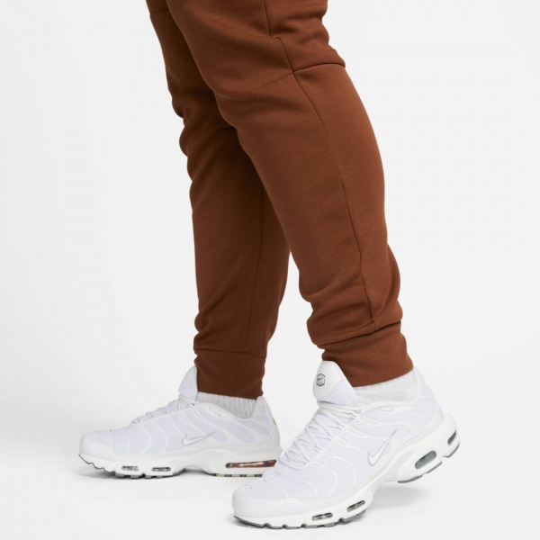 Штани Nike M NSW TCH FLC JGGR CU4495-259 р. M коричневий