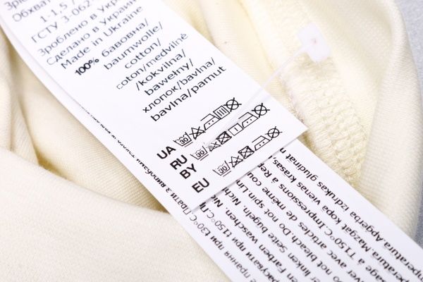 Шапочка детская Bembi ШП76 р.46 молочный с рисунком