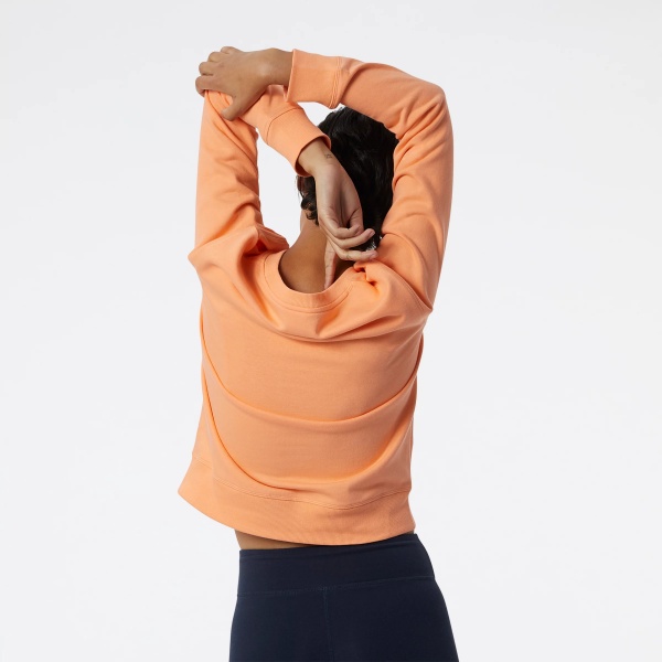 Свитшот New Balance WT03551PGZ р. M оранжевый