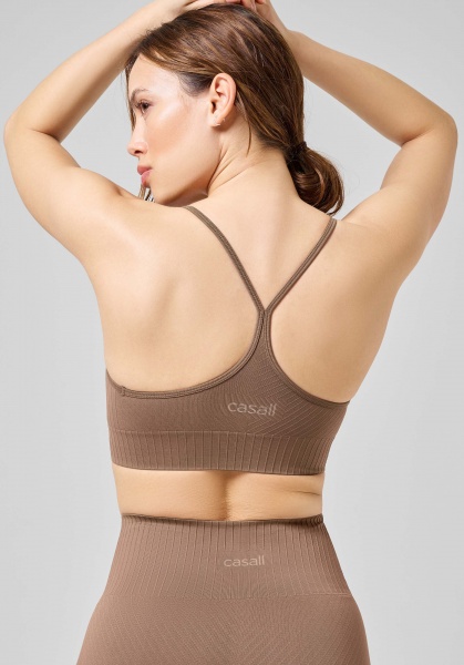 Бра Casall SEAMLESS GRAPHICAL RIB SPORTS TOP 22210-446 р.S коричневий