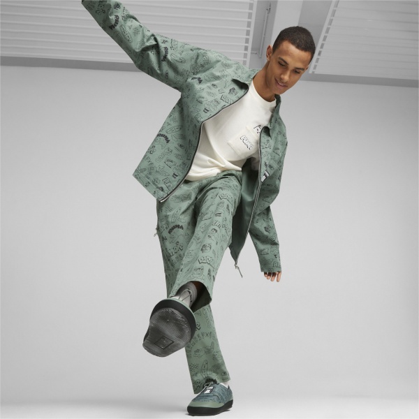 Брюки Puma PUMA X RIPNDIP AOP TWILL PANTS 62220044 р. M зеленый