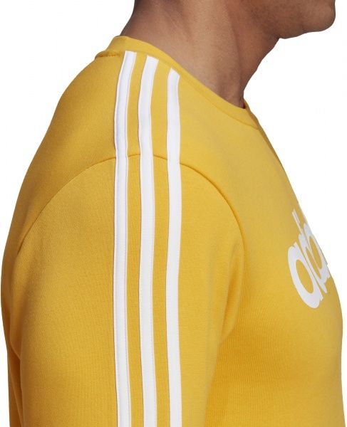 Джемпер Adidas E 3S CREW FL GD5387 р. M жовтий