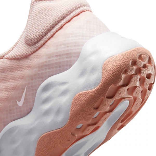 Кроссовки Nike W NIKE RENEW RIDE 3 DC8184-600 р.37,5 персиковый