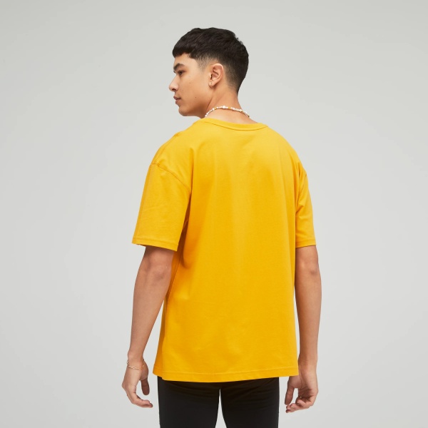 Футболка New Balance UT21503VGL р.4 жовтий