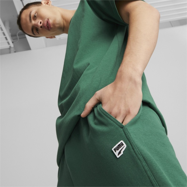 Брюки Puma DOWNTOWN SWEATPANTS TR 53825037 р. M зеленый