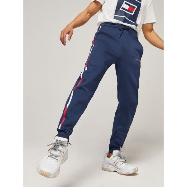 Штани Tommy Hilfiger FLEECE TRACK PANT WITH TAPE S20S200294401 р. M темно-синій