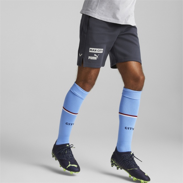 Шорты Puma MCFC CASUALS SHORTS 76774119 р. L синий