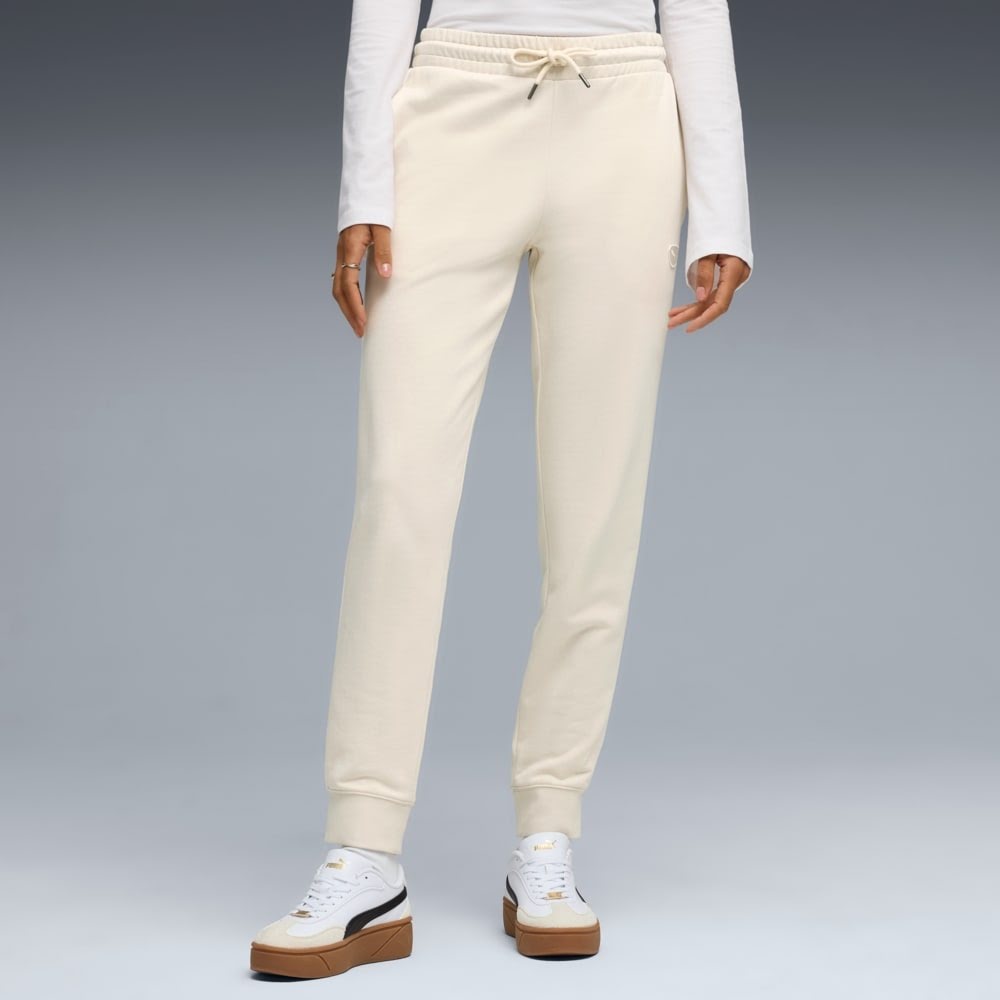 Брюки Puma Ess Elevated Sweatpants Tr Cl 69185887 р. S бежевый — фото 1