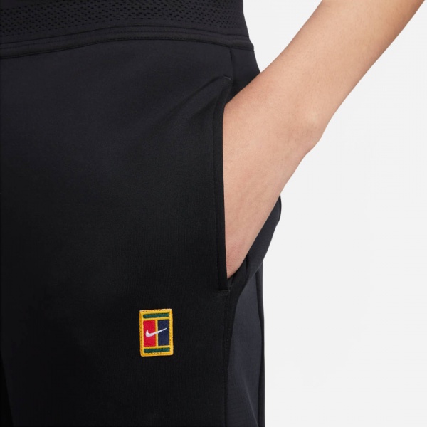 Брюки Nike W NKCT DF HERITAGE PANT DX1129-010 р. S черный