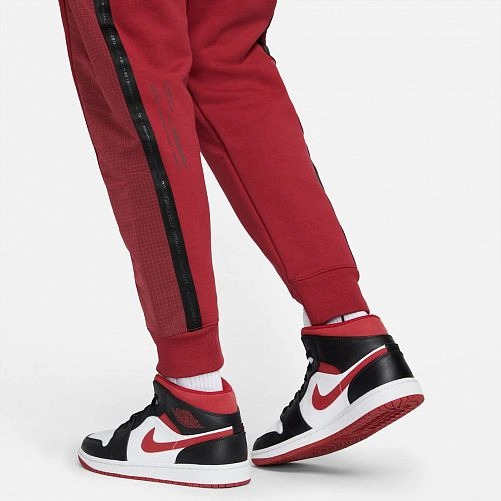 Штани Nike 23ENG STMT FLC PANT DJ0180-690 р. M червоний