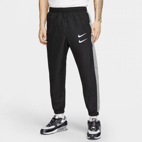 Брюки Nike M NSW SWOOSH PANT WVN CJ4877-010 р. XL черный