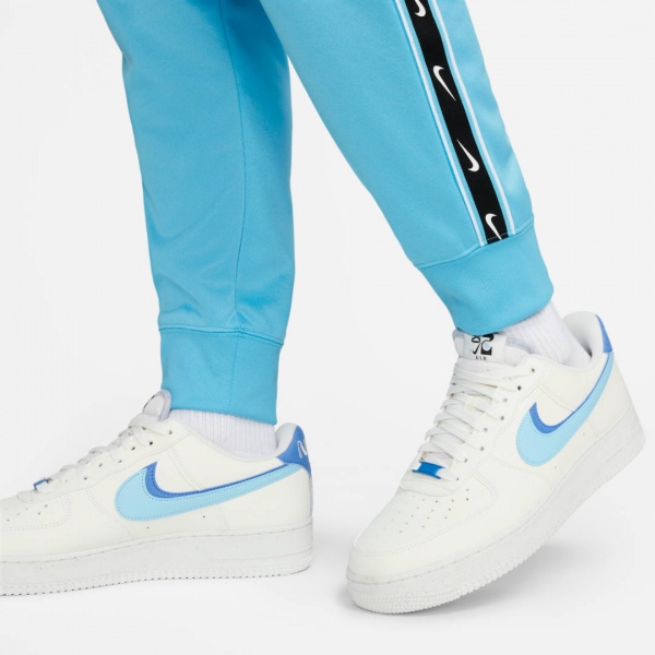Брюки Nike M NSW REPEAT SW PK JOGGER DX2027-416 р. S голубой