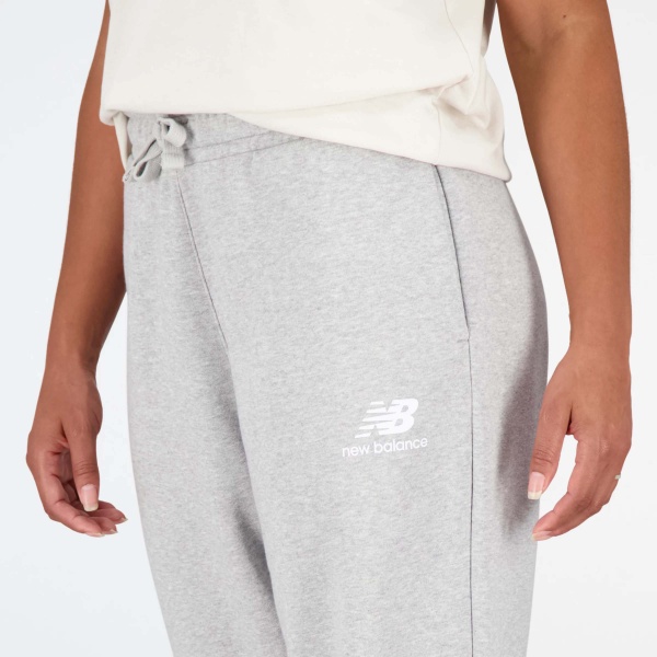 Брюки New Balance ESSENTIALS STACKED LOGO WL WP31516AG р. L серый