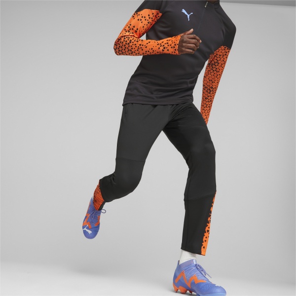 Брюки Puma INDIVIDUALCUP TRAINING PANTS 65829550 р. L черный