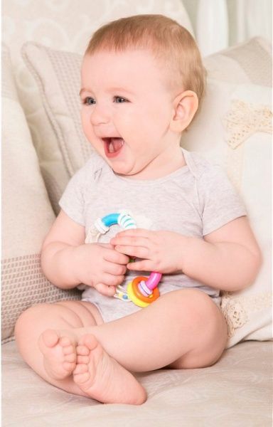 Погремушка Bebelino восьмерка Твист