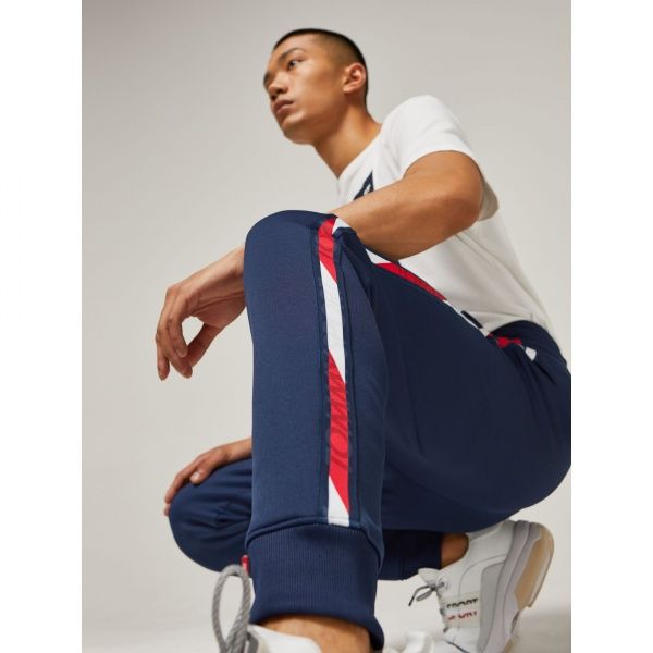 Штани Tommy Hilfiger FLEECE TRACK PANT WITH TAPE S20S200294401 р. M темно-синій