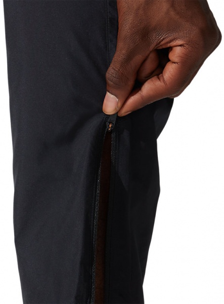 Брюки Asics CORE WOVEN PANT 2011C342-001 р. M черный