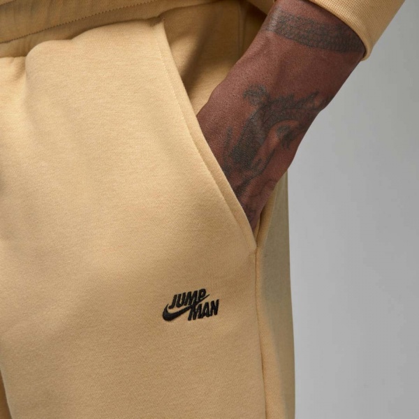 Штани Nike Jordan Flight MVP Men's Statement Graphic Fleece DQ8015-252 р. S бежевий