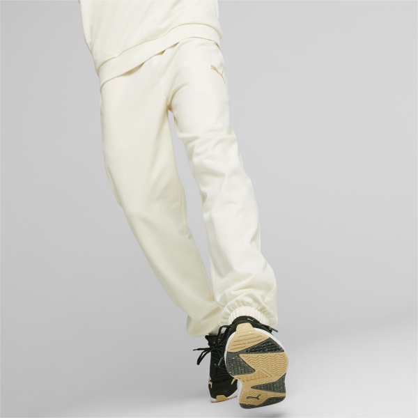 Брюки Puma PUMA ESS BETTER SWEATPANTS TR 67329499 р. M бежевый