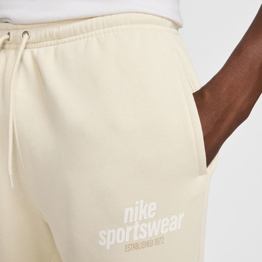 Штани Nike M NK CLUB BB CF PANT NSW GFX HJ2185-234 р. S бежевий