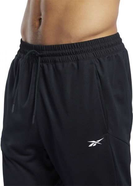 Брюки Reebok WOR KNIT PANT FJ4057 р. XL черный