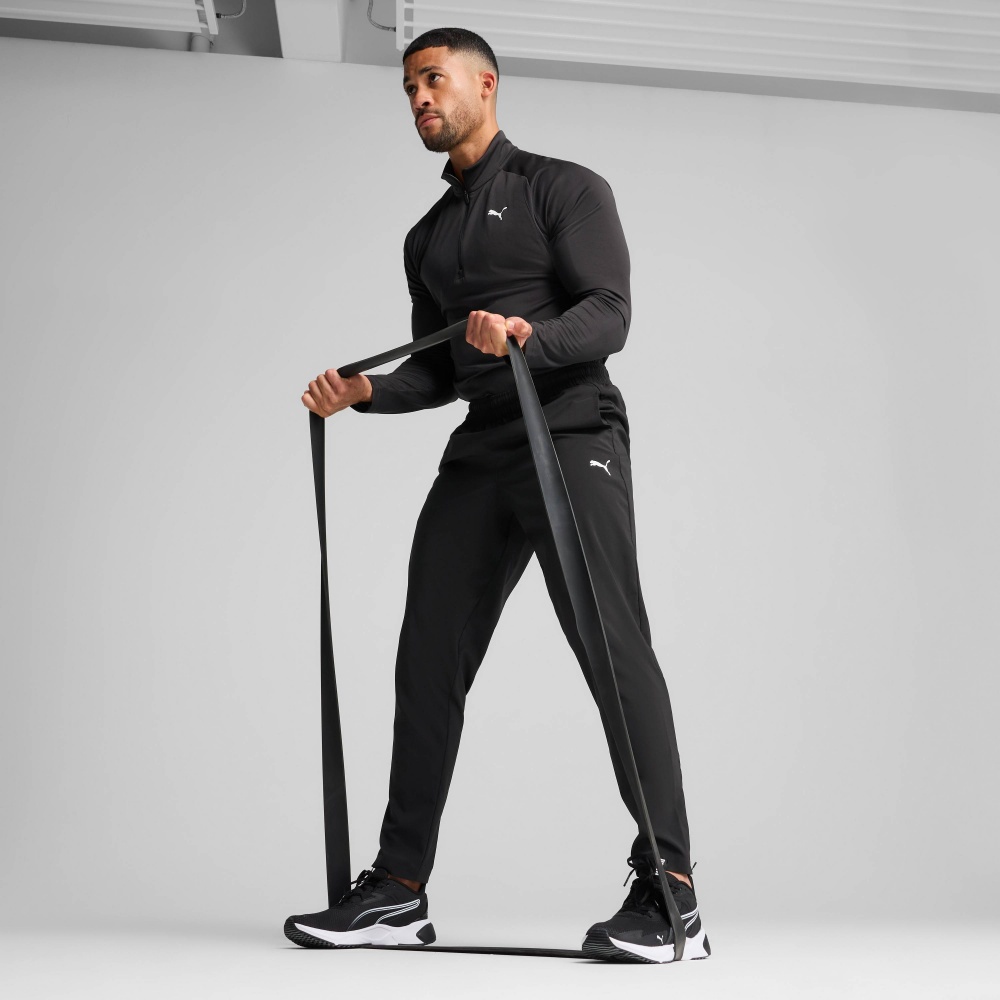 Брюки Puma TAD ESSENTIALS Woven Tapered Pant 52591601 р. S черный