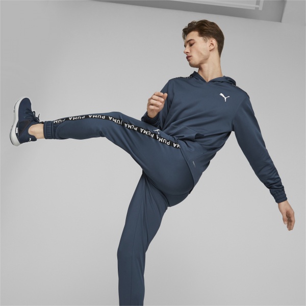 Брюки Puma FIT LIGHTWEIGHT PWRFLEECE JOGGER 52319316 р. S синий