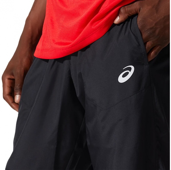 Брюки Asics CORE WOVEN PANT 2011C342-001 р. M черный