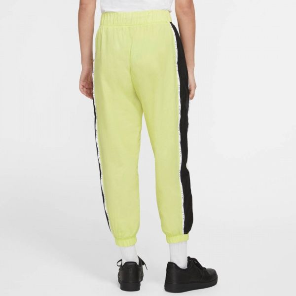 Штани Nike W NSW PANT WVN PIPING CK1408-367 р. L салатовий