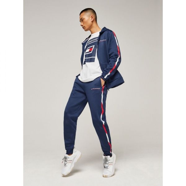 Штани Tommy Hilfiger FLEECE TRACK PANT WITH TAPE S20S200294401 р. M темно-синій