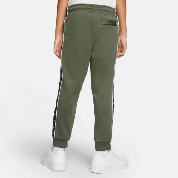 Брюки Nike B NSW JGGR CF PK SWOOSH TAPE CV1335-325 р. M зеленый