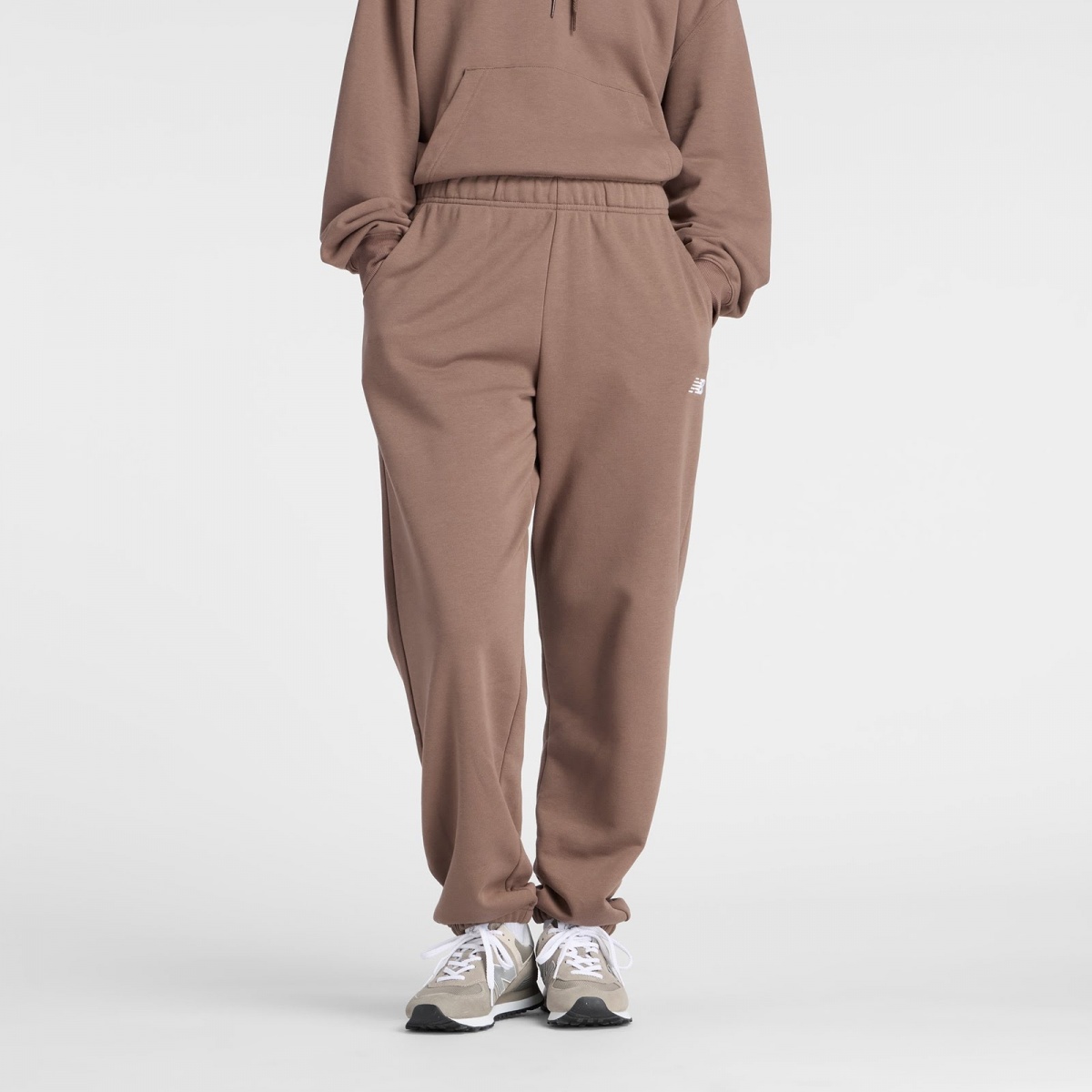 Брюки New Balance WP41500ABP р. M коричневый — фото 1