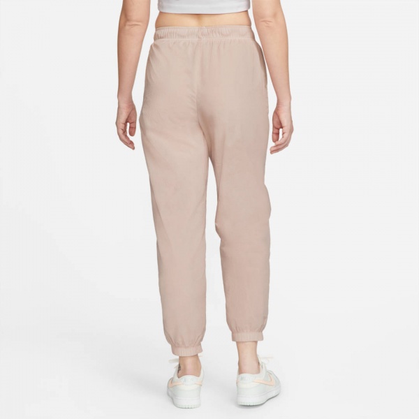 Штани Nike W NSW ESSNTL WVN MR PANT HBR DM6183-601 р. XS рожевий
