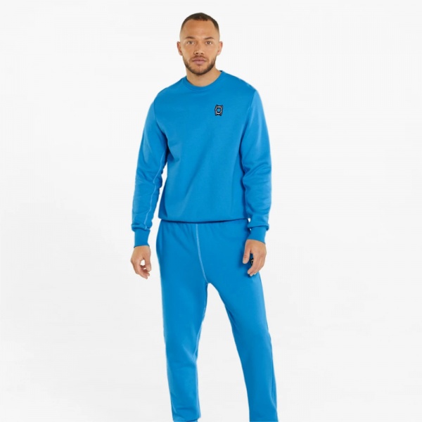 Штани Puma PIVOT PANT EMB 53325109 р. M блакитний