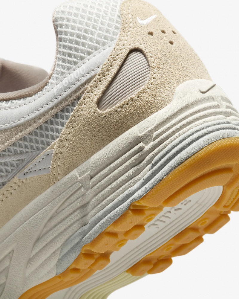 Кросівки жіночі демісезонні Nike W P-6000 OPP1 HV4312-025 р.38,5 сірі із жовтим