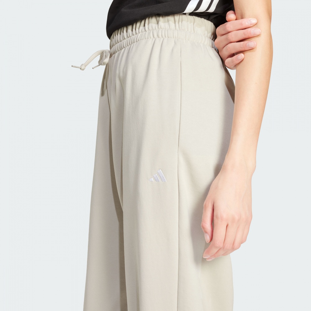 Штани Adidas W SL FT CF PT JC8305 р. XS бежевий