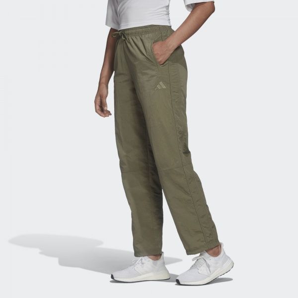 Брюки Adidas W woven pant FI6718 р. XS зеленый