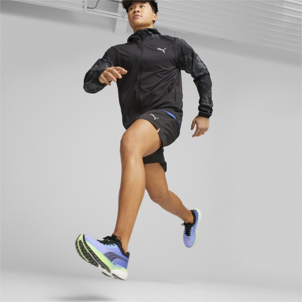 Ветровка Puma RUN FAVORITE AOP WOVEN JACKET 52338901 р.S черный