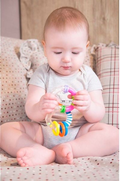 Погремушка Bebelino восьмерка Твист