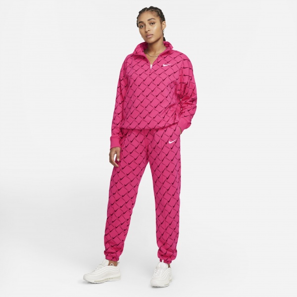 Штани Nike W NSW TREND PANT CF AOP SWOOSH DQ4509-612 р. L малиновий
