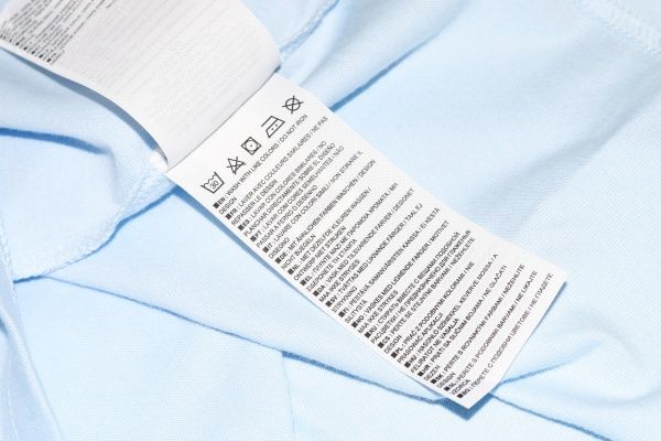 Футболка Converse STRIPED CHUCK PATCH TEE CHAMBRAY 10021497-451 р. 2XL блакитний