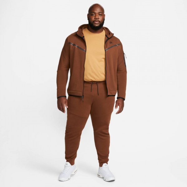 Штани Nike M NSW TCH FLC JGGR CU4495-259 р. M коричневий