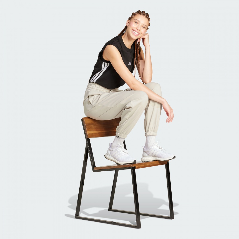 Брюки Adidas W SL FT CF PT JC8305 р. S бежевый