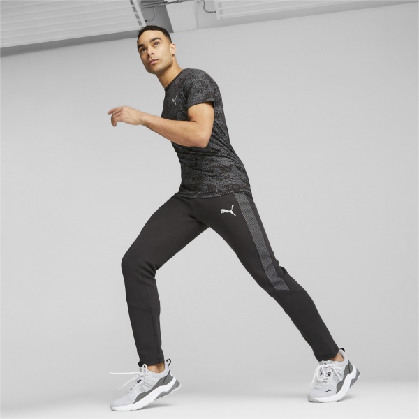 Брюки Puma EVOSTRIPE PANTS DK 67593201 р. XL черный